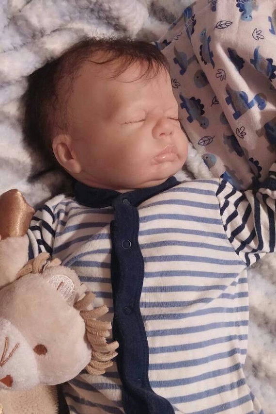 Reborn dolls... cute or creepy?